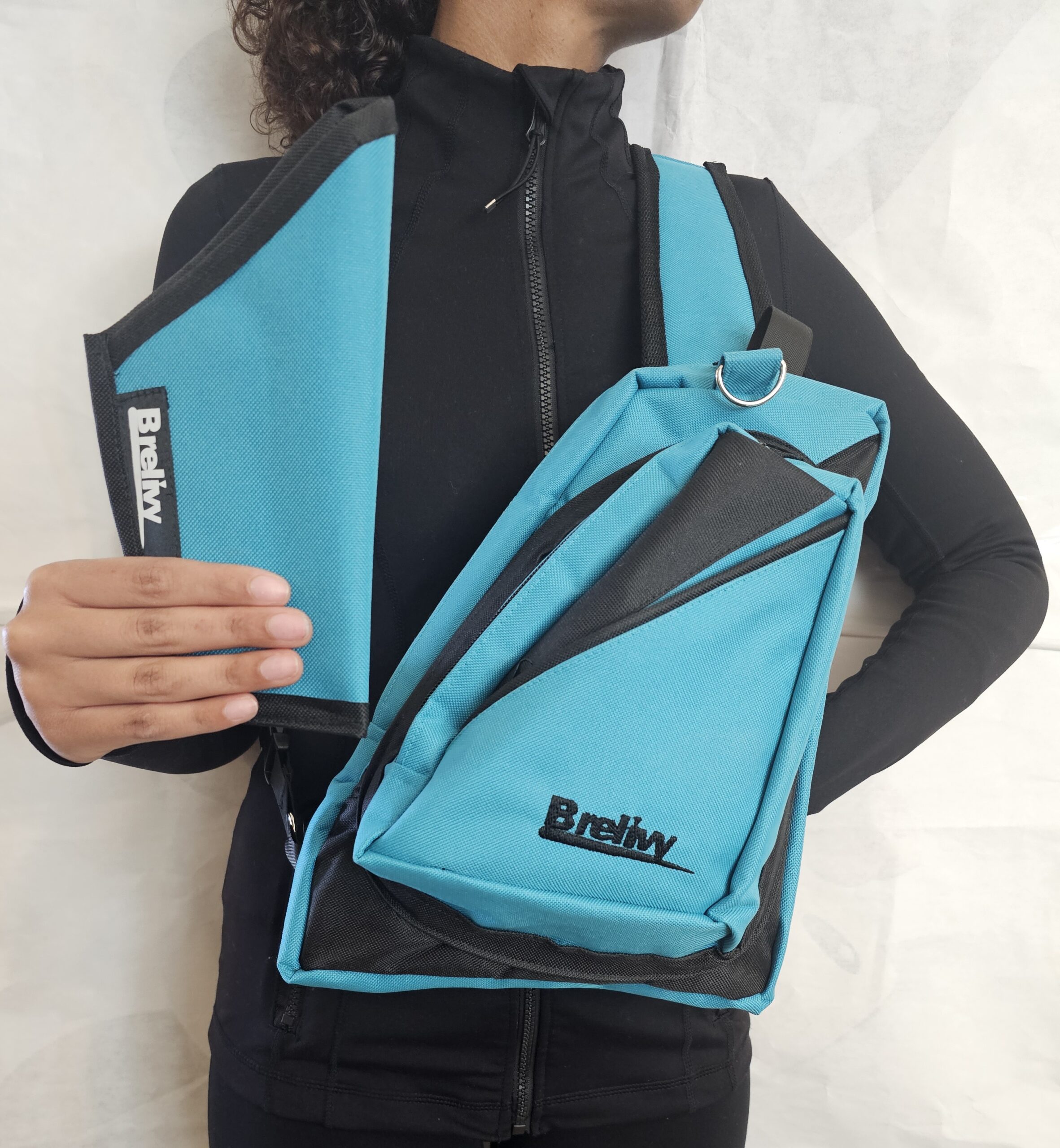 20260907_142407 Conceal Carry Canvas Sling Bag (teal and black) - Image 1