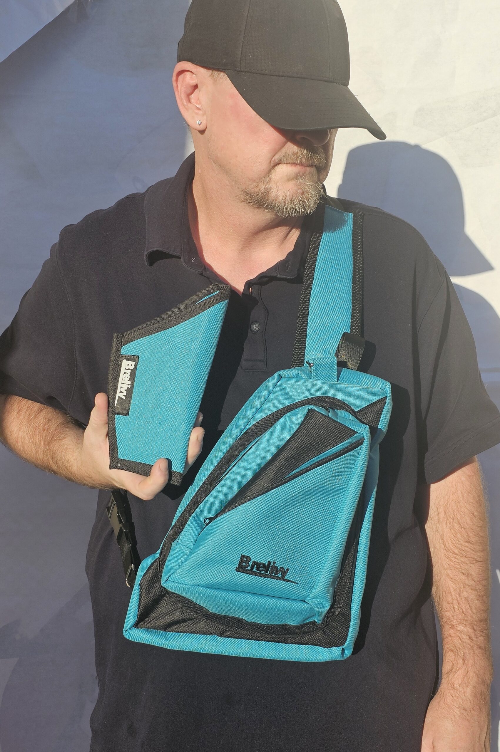 with holster T&B Conceal Carry Canvas sling bag (Teal and Black) - Image 1